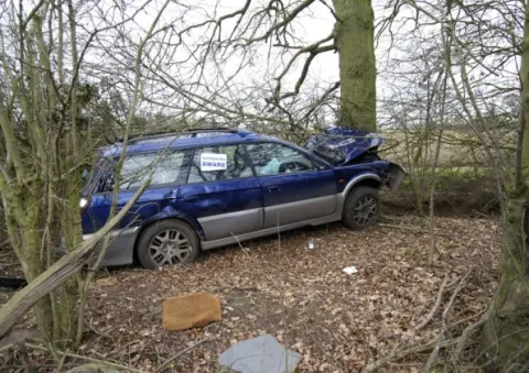 Destroyed car Diss